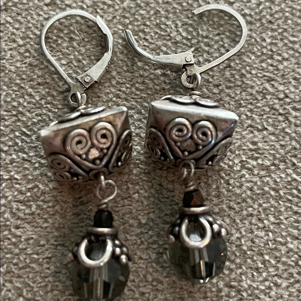Sterling silver (.925) earrings with blue/gray crystals. 2” long
